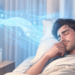 Un hombre acostado en su cama se toca la nariz mientras recibe el flujo de aire de un aparato de aire acondicionado en la pared, con un humidificador en funcionamiento y un vaso de agua en la mesita de noche.