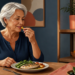 Mujer mayor tomando una cápsula durante una comida con pescado y verduras, con un frasco de suplemento visible al fondo.